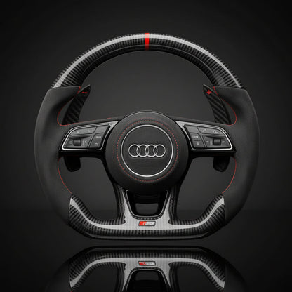 Steering wheel with Audi logo on a black background