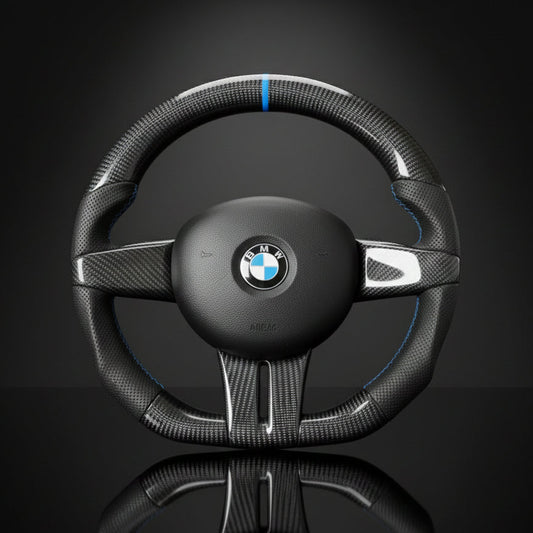 Carbon fiber steering wheel with BMW logo on a black background