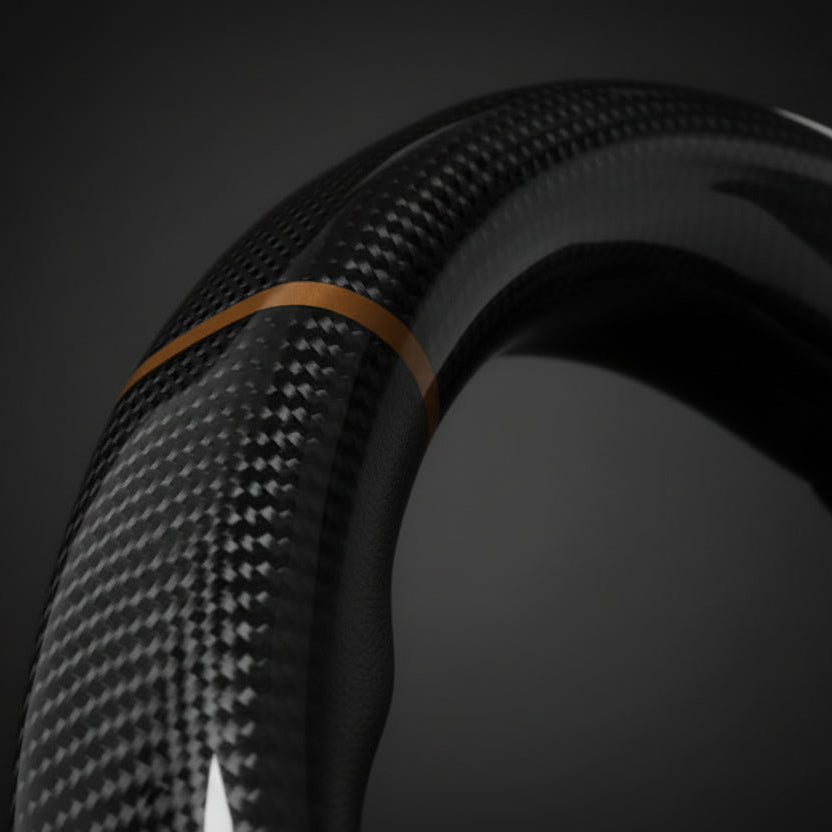 Carbon fiber rim with red accent on a dark background